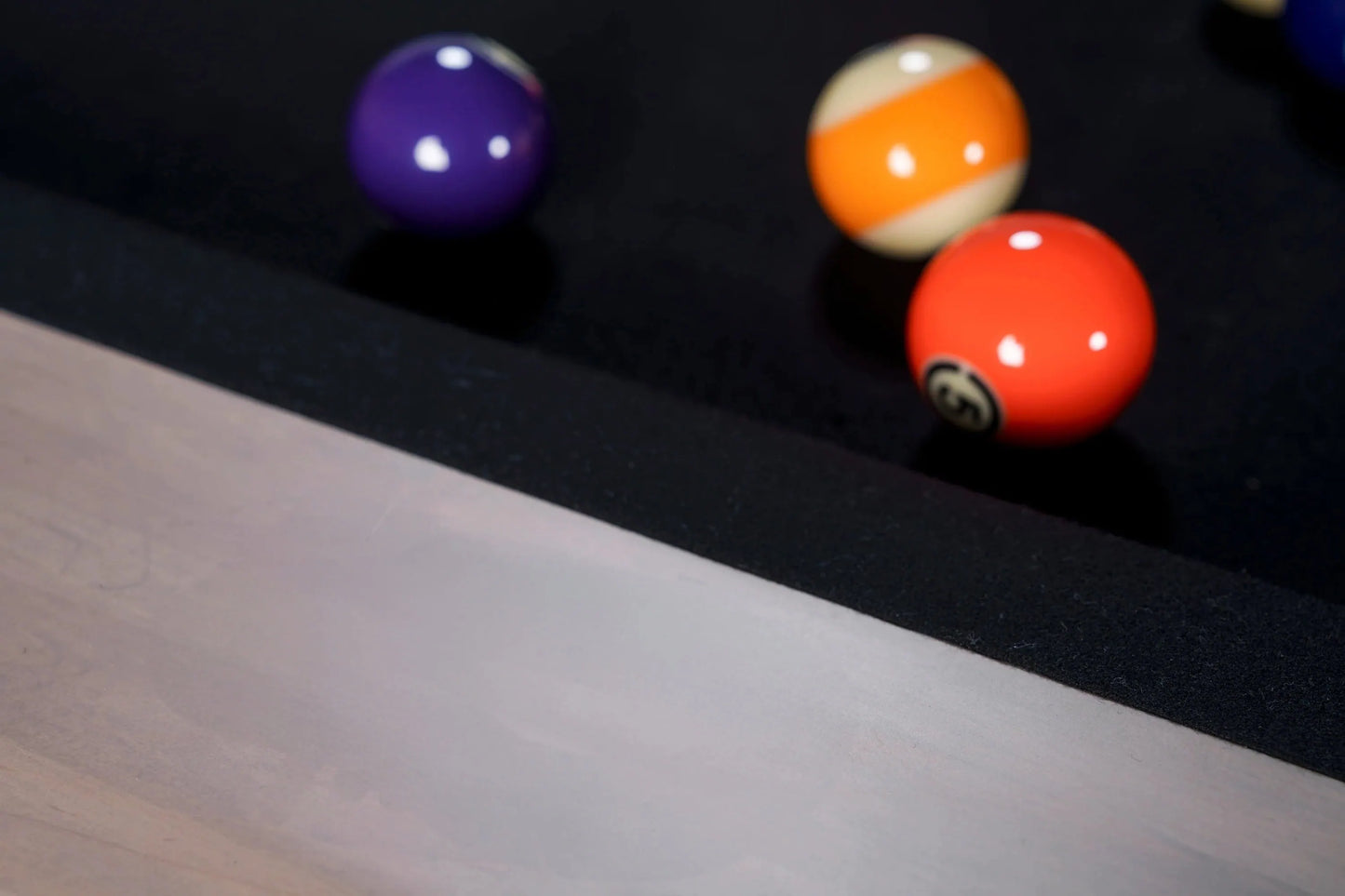 Close-up of pool balls on a pool table